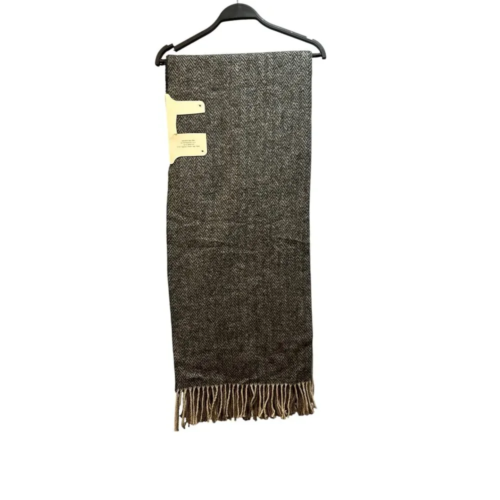 Nido Notte Italia throw blanket gray and cream herringbone pattern with fringe